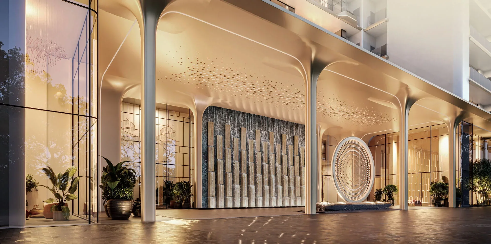 The arrival colonnade with its cascading water wall